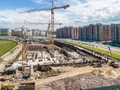 ЖК «Legenda Героев». В корпусе 1 идет устройство перекрытий на отметке «ноль». Аэрофотосъемка. Фото от 26.06.2018 г.