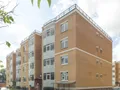 Внешние стены дома сложены из кирпича. Фото от 26.06.2015 г.