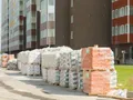 Для отделки фасадов используется декоративная кирпичная кладка. Фото от 30.06.2015 г.