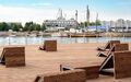 У южной гавани напротив яхт-клуба будет создана рекреационная зона, включающая навес с качелями, велопарковку, зону с лежаками для отдыха.