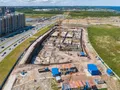 ЖК «Legenda Героев». Во второй очереди выполняют свайное поле. Аэрофотосъемка. Фото от 26.06.2018 г.