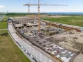 ЖК «Legenda Героев». В корпусе 2 начинается армирование стен и колонн нижнего уровня паркинга. Аэрофотосъемка. Фото от 26.06.2018 г.