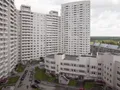 ЖК состоит из монолитных корпусов высотой от 4 до 24 этажей. Фото от 17.08.2015 г.